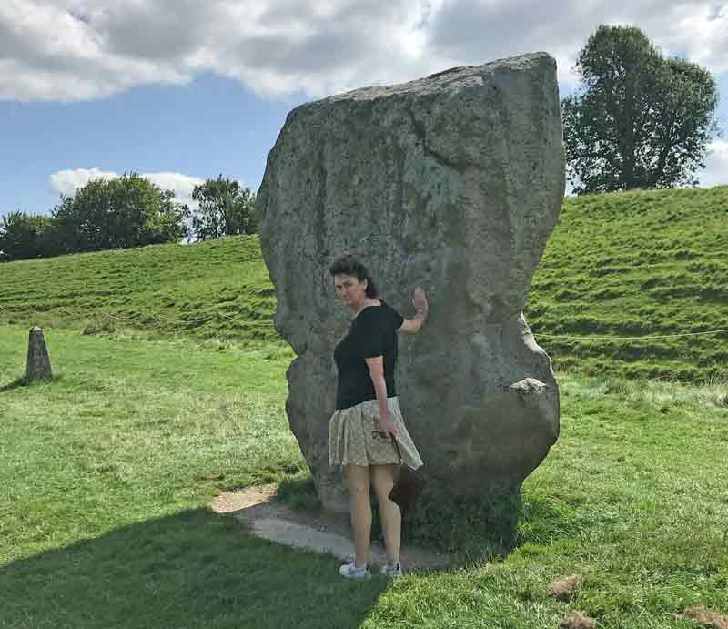 Lady inspecting one of the massive stones.